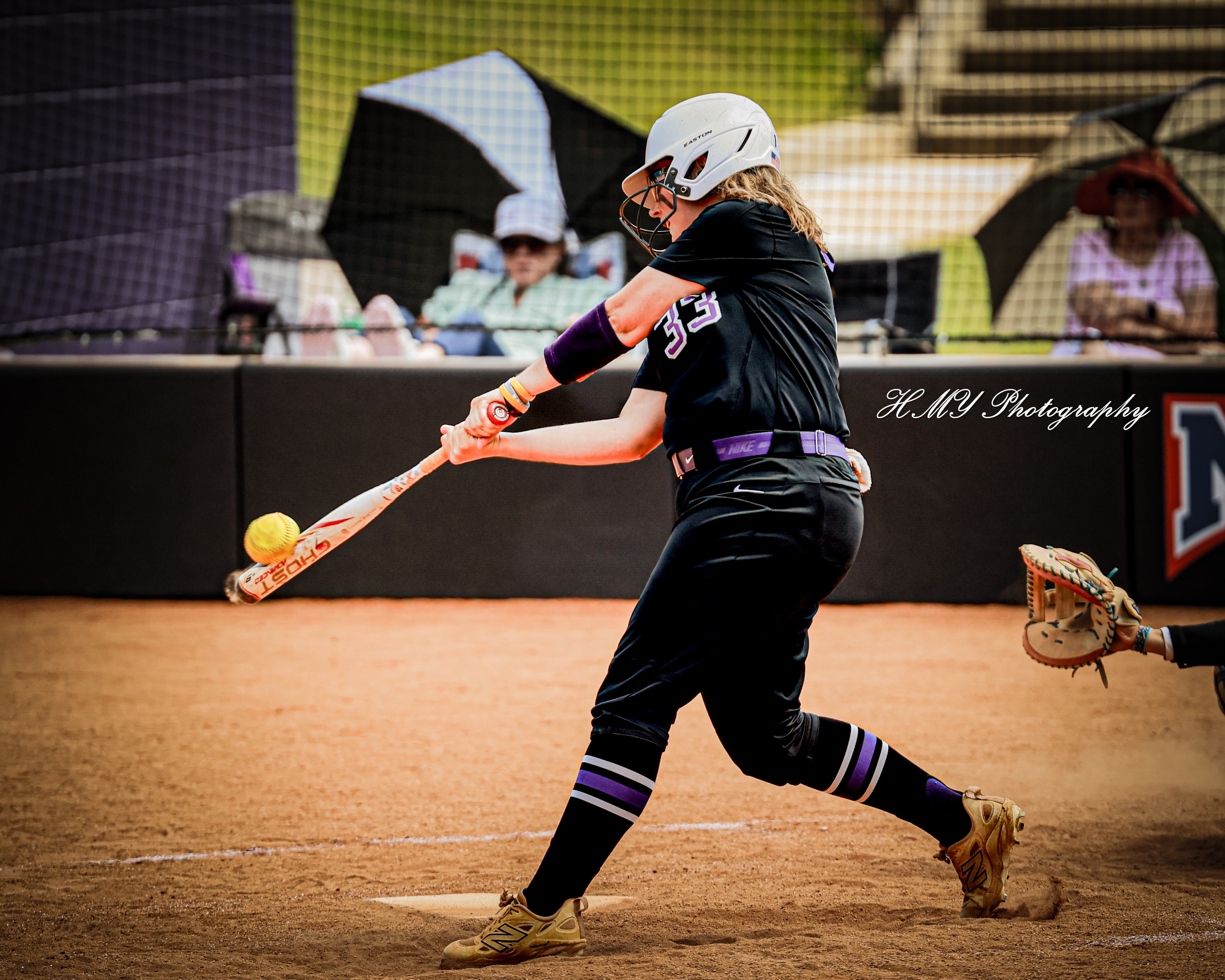 Madison Cheek hitting one of her two home runs, courtesy of Hannsen Meneses