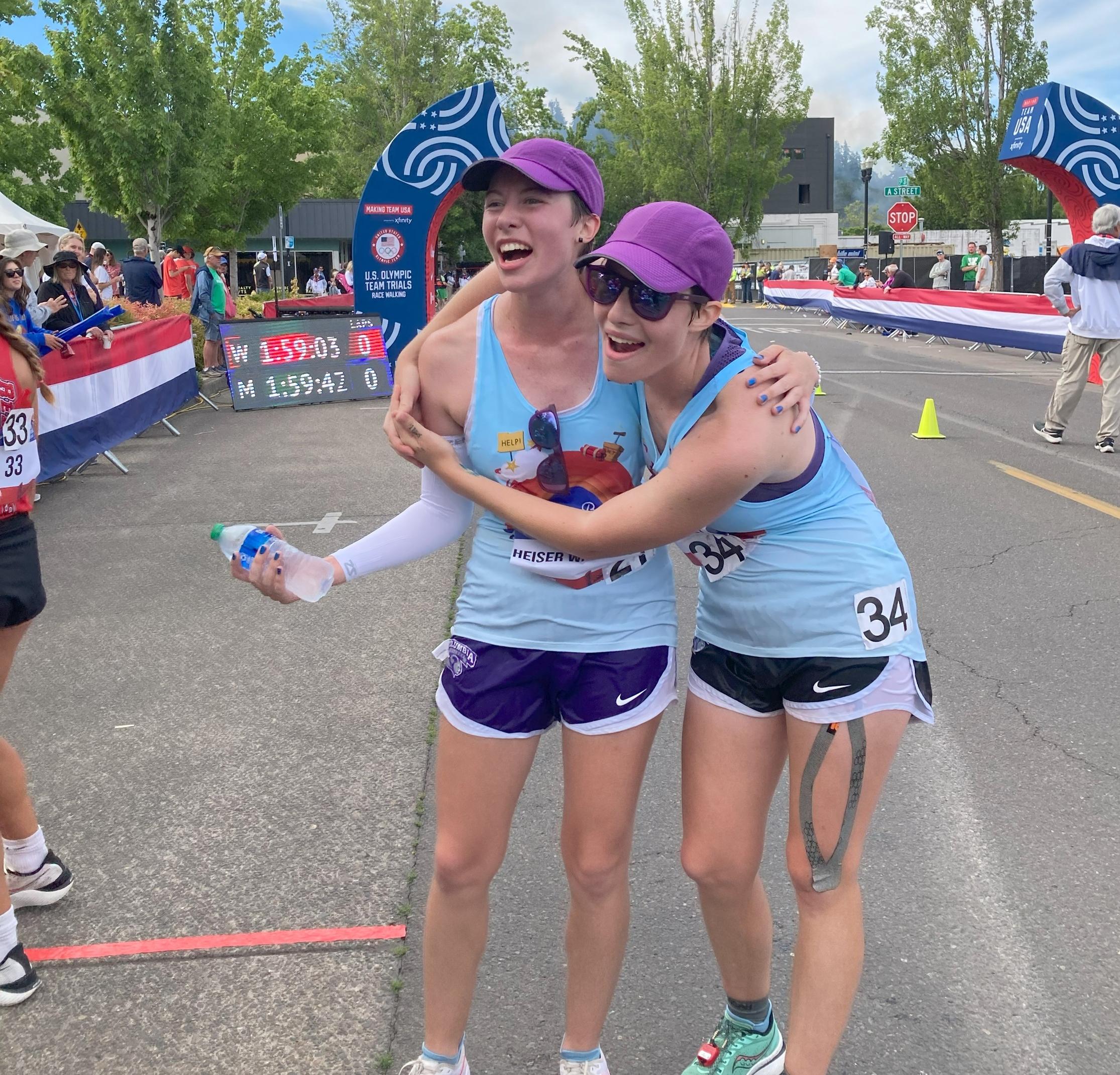 in the finish area, Jesi (right) says "it looks like I am hugging Tori but really I just needed something to lean on so I didn't fall over!", courtesy of Ian Whatley